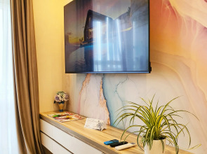 Квартира Уютные современные апартаменты рядом с центром