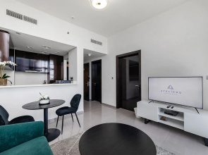Апартаменты Stylish 1BR at Damac Merano Tower with Great View