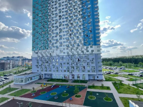 Квартира Уютная студия в 5 минутах от ТРЦ Планета