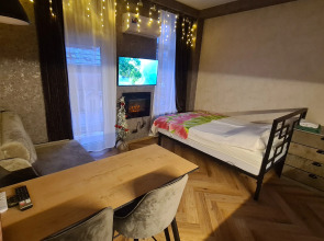 Апартаменты Квартира с Камином