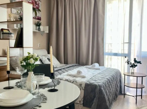 Квартира Уютная студия в 5 минутах от ТРЦ Планета