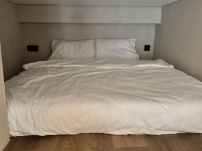 Квартира Дизaйнерcкая двухуровневая в Сириусе