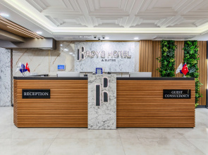 Отель Roys Hotel & Suites