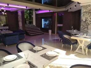 Отель Dilimah Premium Luxury