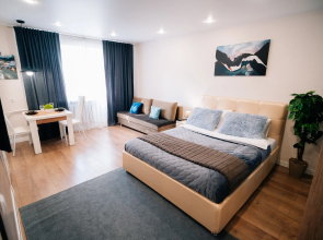 V Tsentre Goroda Apartments