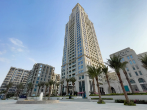 Апартаменты Сozy 1BR at Vida Residences Creek Beach