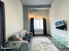 Квартира Просторная студия в центральной части города