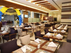 Отель Golden Tulip Media