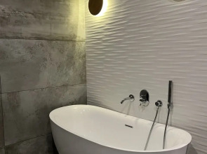 Квартира Дизайнерский аппартамент в центре города