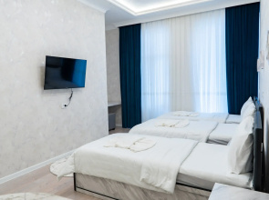 Отель Status Inn