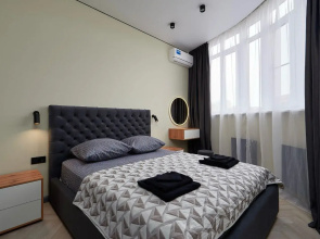 V Tsentre Goroda Flat