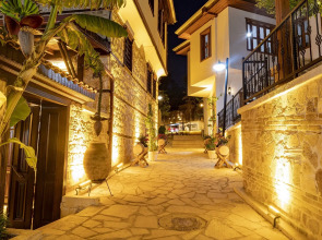 Отель WOO Town Suites