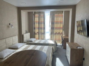 Апартаменты у моря с видом на бассейн