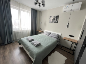 Квартира Современная уютная квартира рядом с Мамаевым Курганом