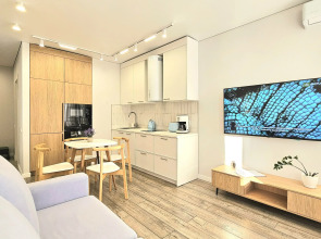 Квартира Современный Комфорт в Удобной Локации от Urban Apartments