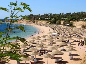Курортный отель Domina Coral Bay