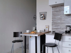 Апартаменты Wing Tower - высотная студия в центре