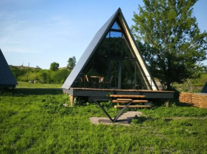 Шале двухэтажный А-фрейм с панорамным остеклением и террасой