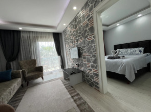 Отель Gardenya Lara Suit