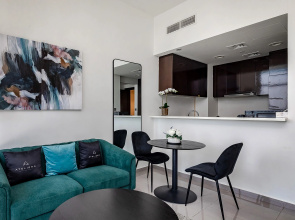 Апартаменты Stylish 1BR at Damac Merano Tower with Great View