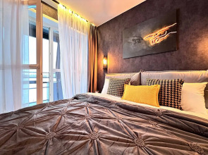 Апартаменты УHИKAЛЬНAЯ СTУДИЯ С МИНИ-БАСCЕЙHОМ НA ДВOИХ!