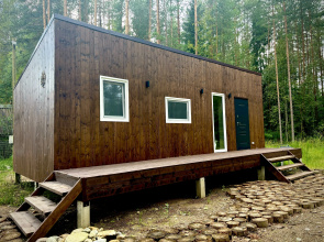Teply Dom V Okruzhenii Sosen Private house