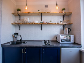 Апартаменты с видом на закат и крыши