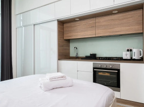 Апартаменты Welcome Home in Studio One Tower Студия