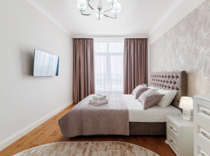 Апартаменты AURA с панорамными окнами и видом на горы