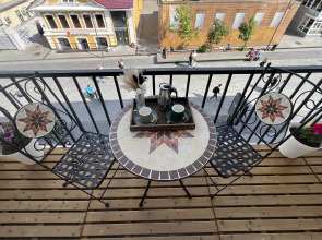 Квартира Уютный Лофт с балконом на главной улице Столицы Закатов