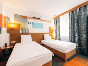 Отель Inn OZZ Astana