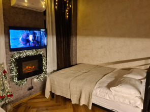 Апартаменты Квартира с Камином