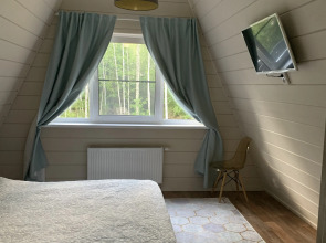 Частный дом A-фрейм в лесу Зеленого города