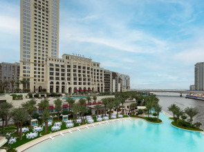 Апартаменты Сozy 1BR at Vida Residences Creek Beach