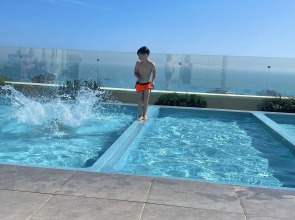 Апартаменты Умные с бассейном у Дендрария