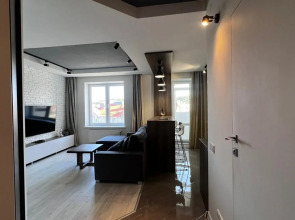 Апартаменты Стильная студия на побережье