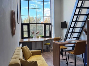 Апартаменты Уютная Студия на Вольной