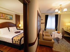 Отель Glk Premier Regency Suites & Spa
