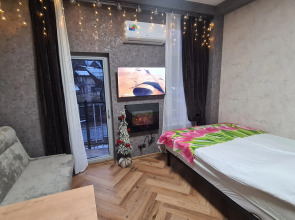 Апартаменты Квартира с Камином