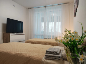 Uyutnaya S Teploy Lodzhiey Flat