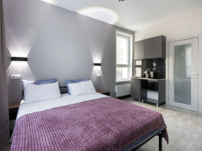 Апартаменты Студия на П. Романова