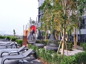 Апарт-отель Expressionz suites by iHost Global