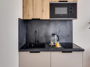 Апартаменты Уютная Дизайнерская Студия у Метро Ботанический Сад