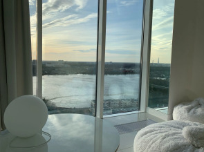 Апартаменты Белая Романтическая Студия с Панорамным Видом