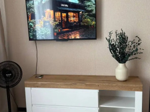 Квартира Уютная студия в 5 минутах от ТРЦ Планета