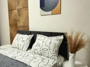 V Tsentre Goroda Flat