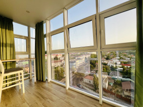 Апартаменты UzorApart Очаровательная студия в центре с потрясающим видом на закат