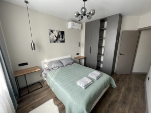 Квартира Современная уютная квартира рядом с Мамаевым Курганом