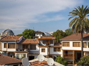 Отель WOO Town Suites