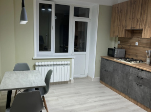 V Tsentre Goroda Flat